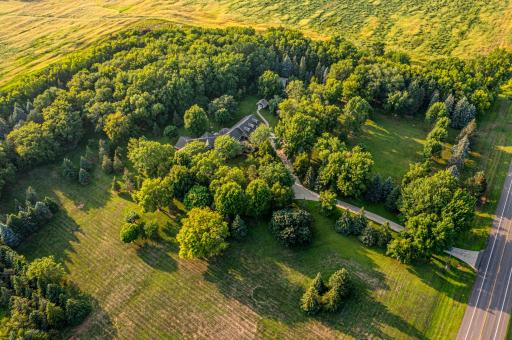 3 bedroom 4 bath house on 15 acres of land features mature trees and wildlife. Country living on the edge of town near a golf course and lake.