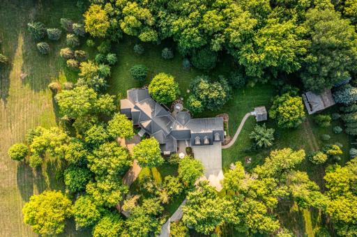3 bedroom 4 bath house on 15 acres of land features mature trees and wildlife. Country living on the edge of town near a golf course and lake.