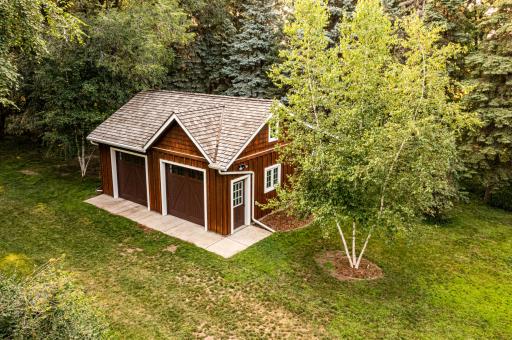 26 x 30 detached garage with 2 overhead doors with garage door opener.