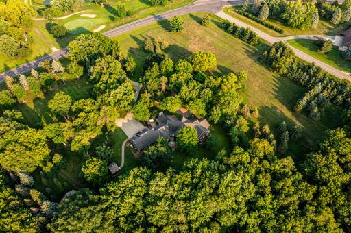 3 bedroom 4 bath house on 15 acres of land features mature trees and wildlife. Country living on the edge of town near a golf course and lake.