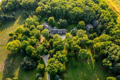 3 bedroom 4 bath house on 15 acres of land features mature trees and wildlife. Country living on the edge of town near a golf course and lake.