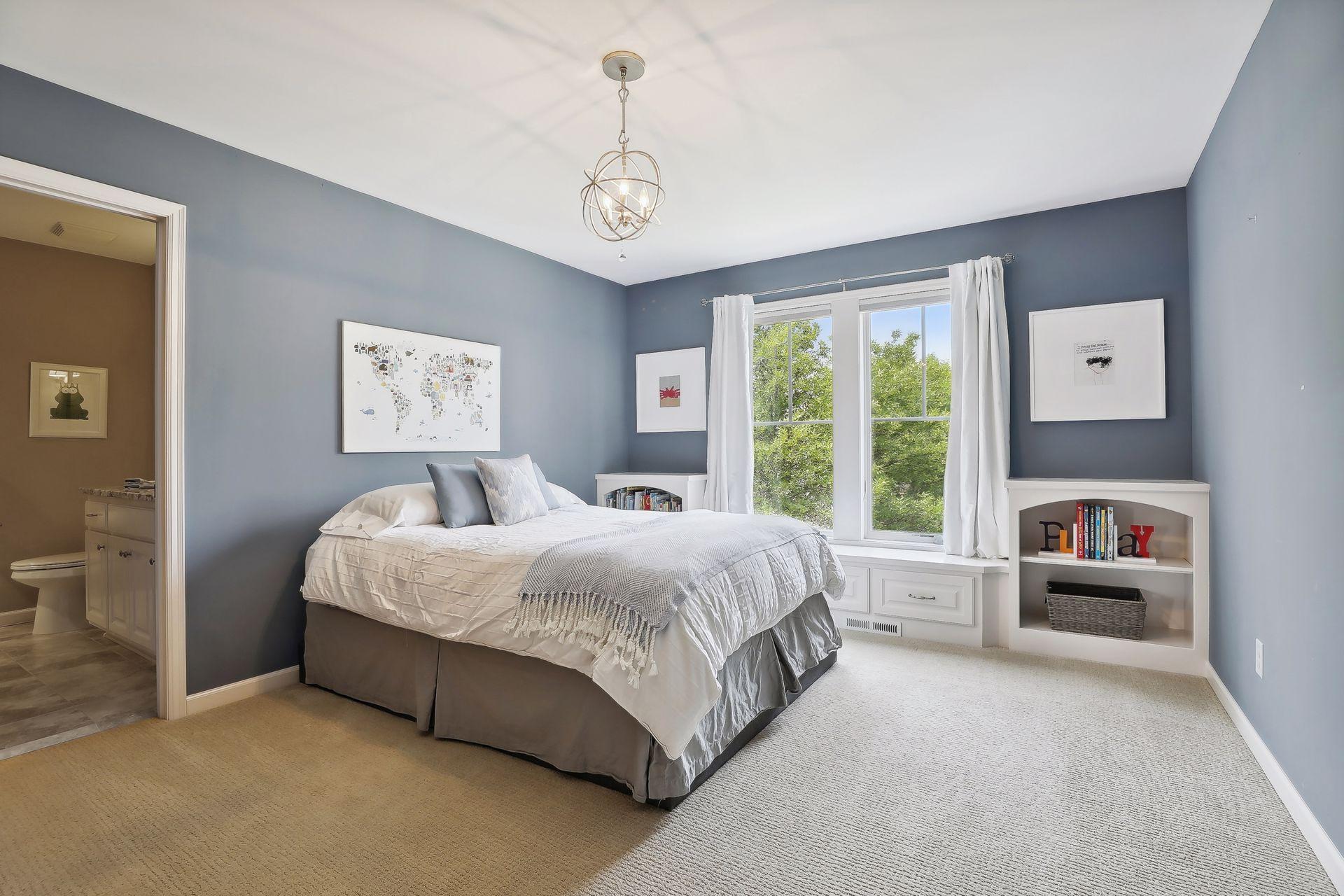 Third junior bedroom also features walk-in closet and ensuite three-quarters bathroom.