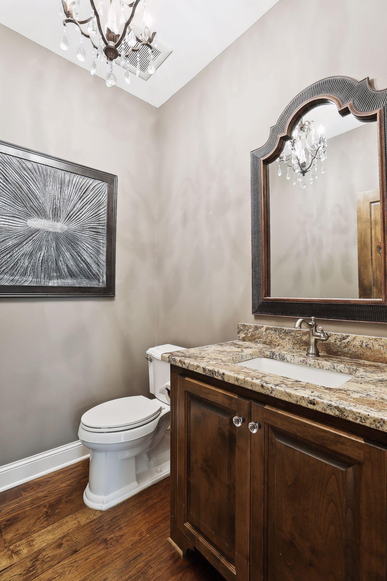 This powder room services the main level.