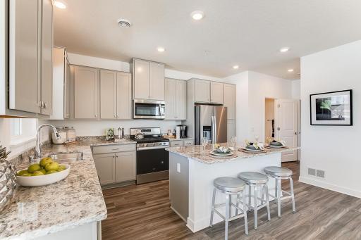Beautiful kitchen in stone gray (photos of model home)