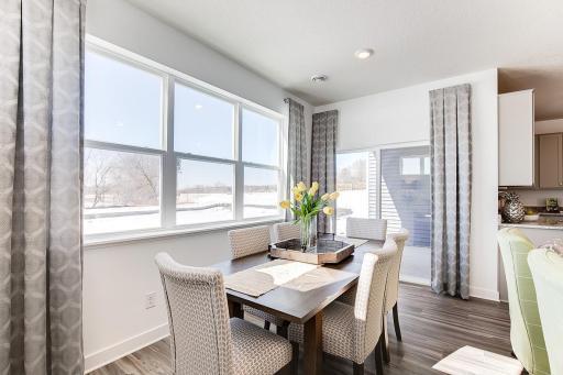 Dining that can easily set 6 (photos of model home)
