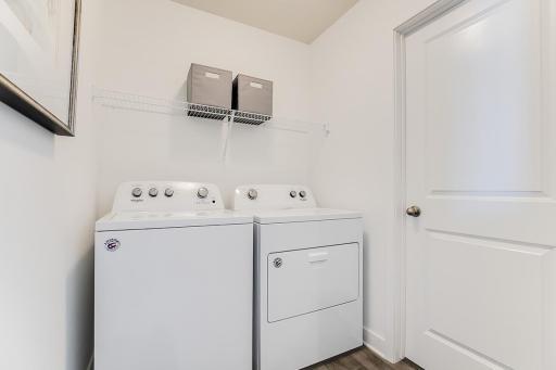 Laundry located upstairs with bedrooms for your convenience (photos of model home)