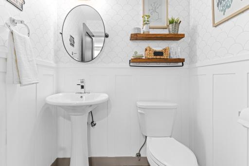 The convenient main level half bath is located just off the mud room