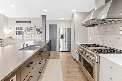 Calling all chefs! The kitchen is adorned with high-end appliances
