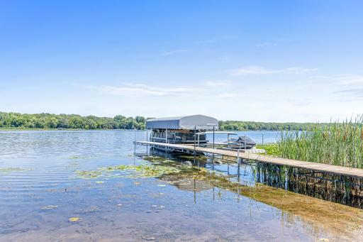 The dock and lift are both included in the home sale, and the boat is available for purchase