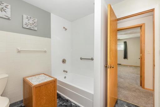Main floor bathroom with NEW tub installed.