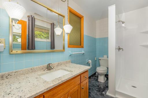 Owner's suite 3/4 bathroom with NEW shower.