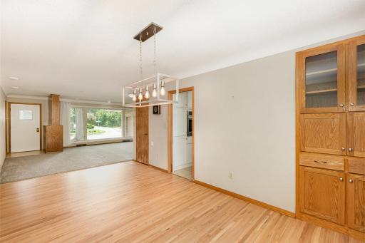 Notice the original built in cabinetry in the dining area. Perfect for storing your dining supplies.