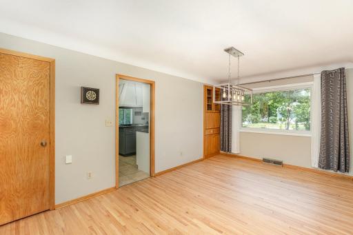Hardwood floor in dining room was refinished end of June.