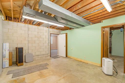 Storage room is 17' x 13'. The door behind the open door is a closet within the storage room!