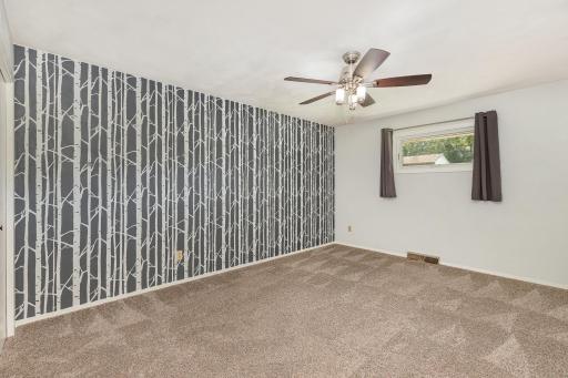 Bedroom #2 with adorable accent wall.