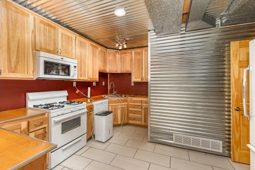 Lower level offers full kitchen. Perfect for multignerational living.