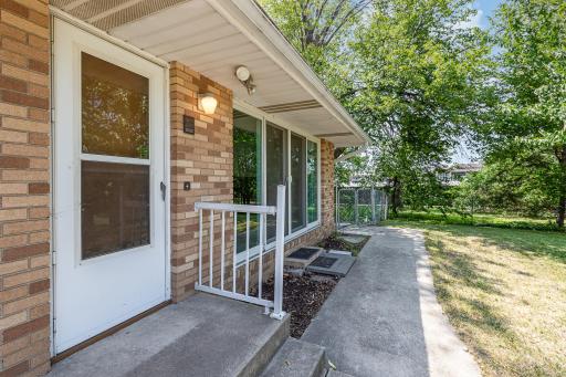 You have access to the back yard through this door as well as the slding glass doors beyond that.