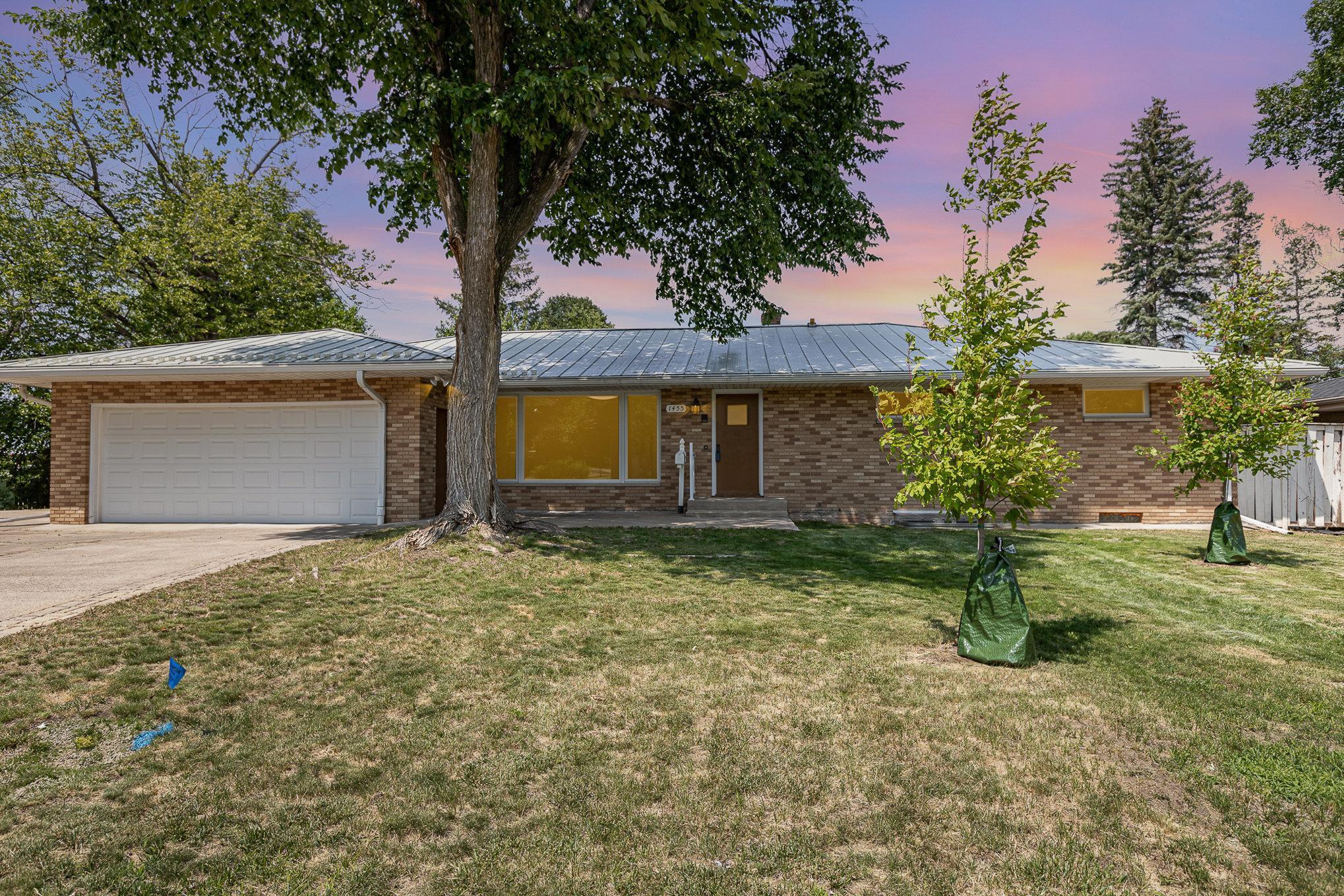 Welcome home to this sprawling mid-century modern rambler home.