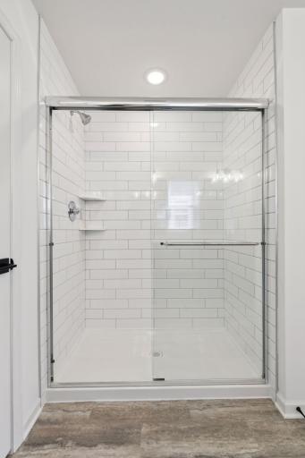 4x16 floor to ceiling tile in the owner's shower.