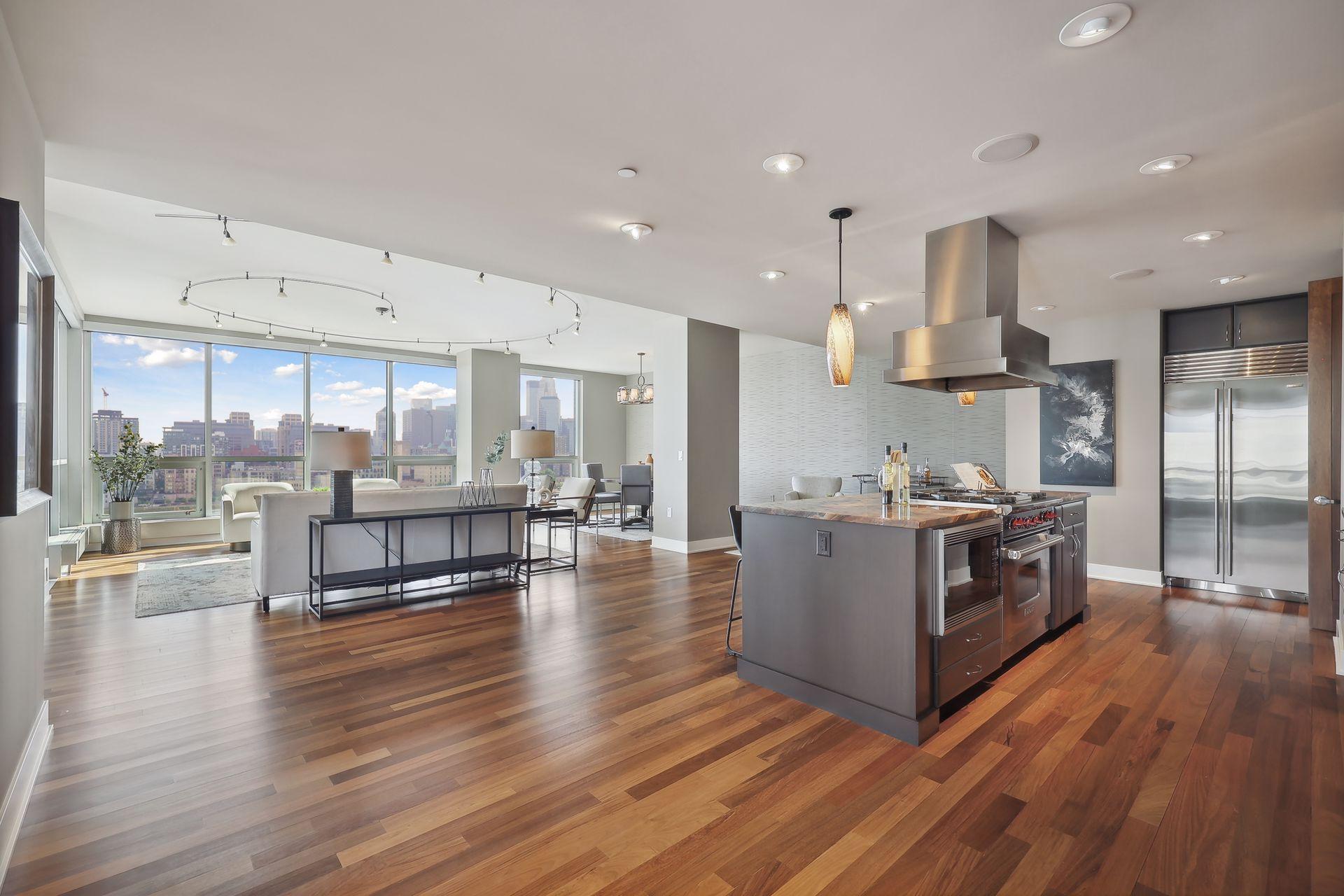 Gleaming hardwood floors run throughout this condo, well appointed and well placed appliances in the kitchen to please the most finicky chef. Positionable lighting above the cooking/preparation area .