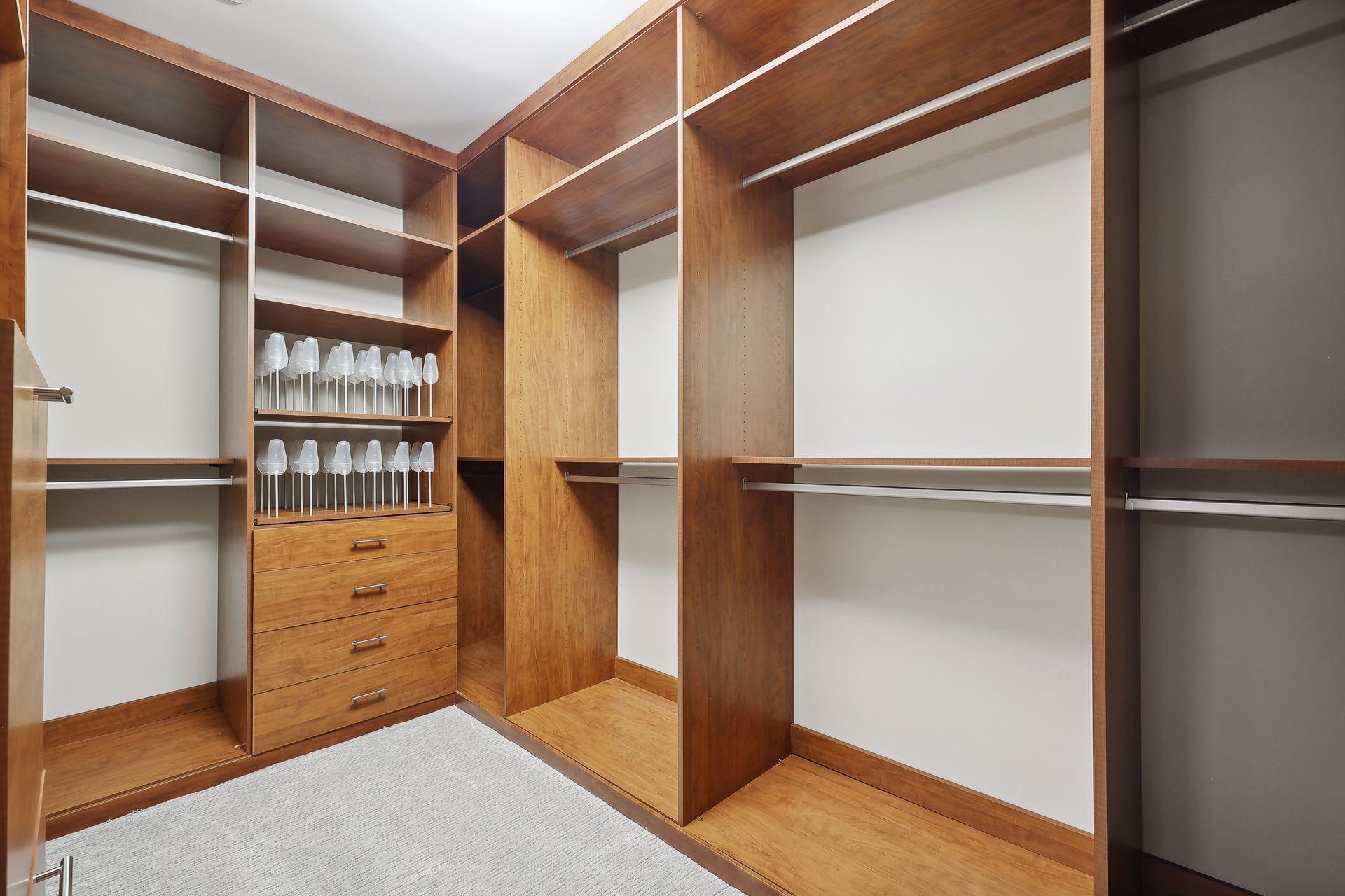 Two shoe storage pull-outs and customized purse storage make this closet even more special.