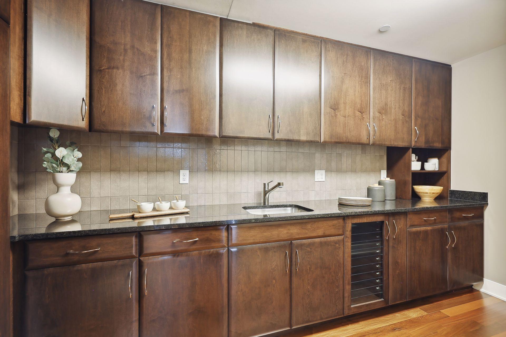 The butlers panty, wet bar and so much storage including a customized platter cabinet with glass shelves.