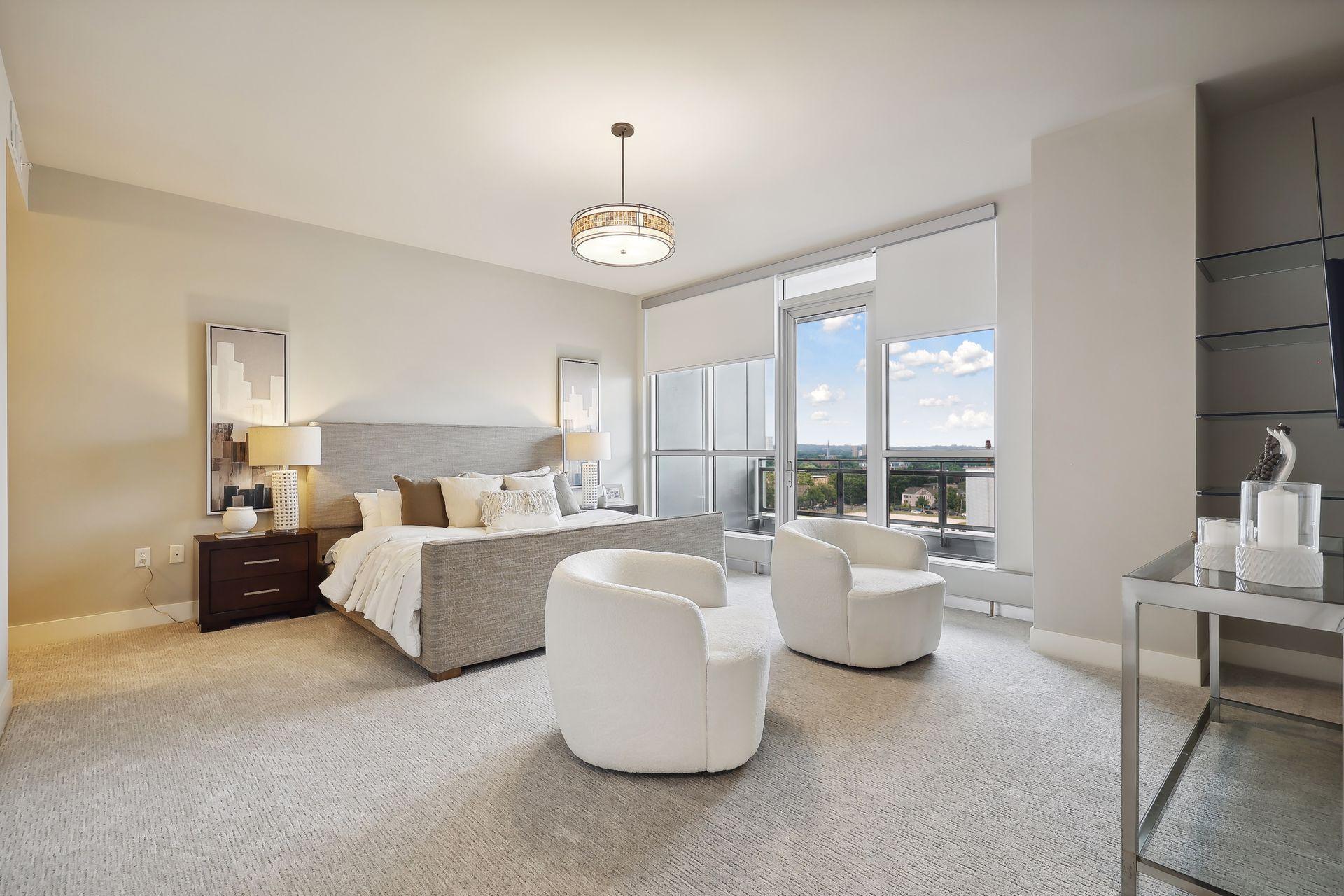 Serenity awaits you in this spacious primary suite, with a private terrace, built in library shelves and two closets. Remote activated blinds throughout this condo, are really welcome here with the morning sun!