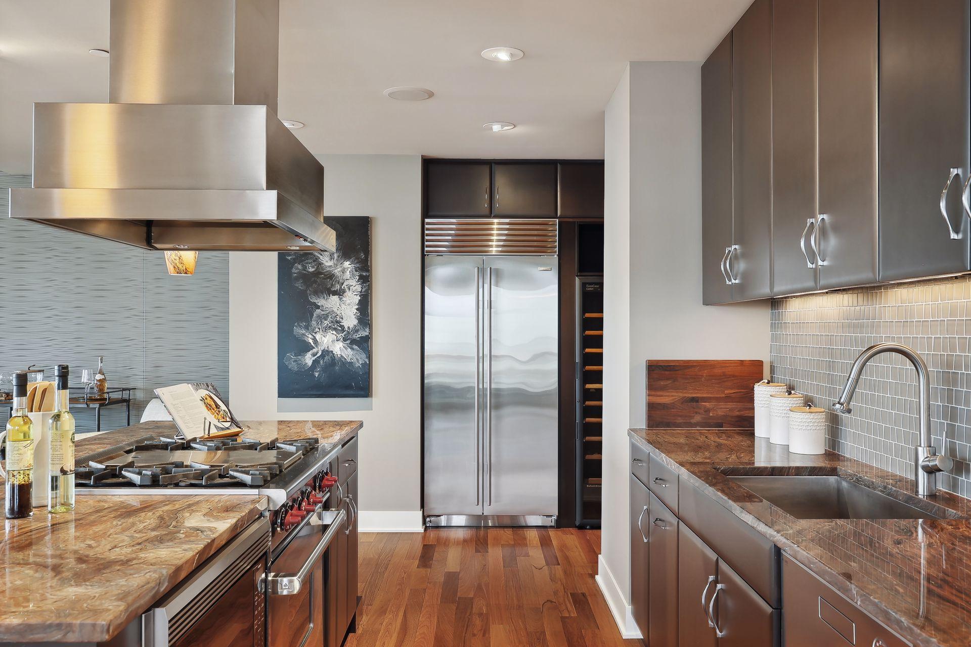 Passing the Subzero refrigerator/freezer and wine storage you enter the butlers pantry to the right.