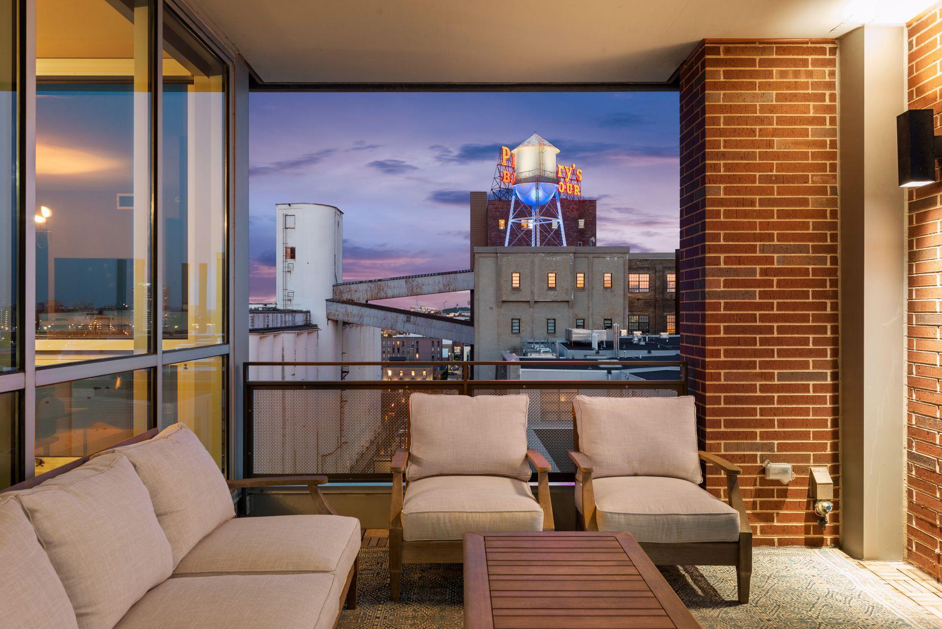 Enjoy life in The Mill District, the city's historical and cultural epicenter. This is your private terrace, really an outdoors room. Tucked back from the wind but surely offers the views!