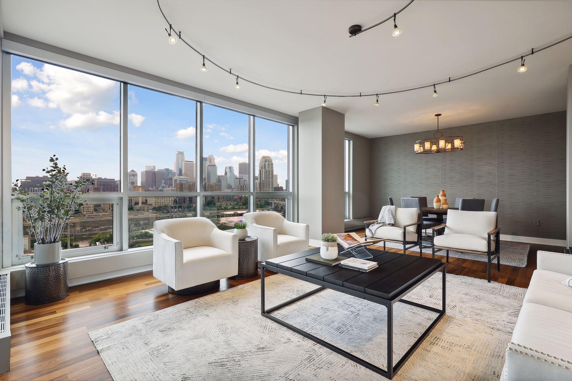 The former (and only other owners) are meticulous art aficionados, they engaged local designer/artist Carter Averbeck to create the dramatic, textured gray wall you see behind the dining area.