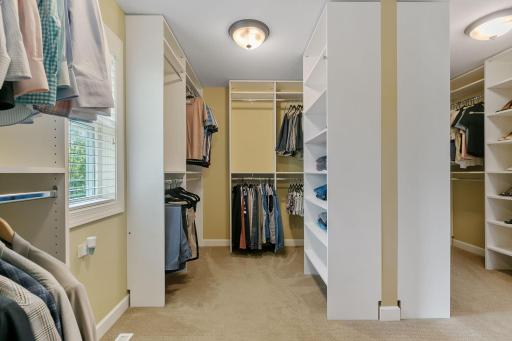 Spacious walk-in closet w/ custom organizer
