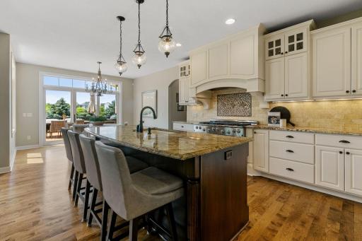 Granite countertops w/ travertine subway tile backsplash