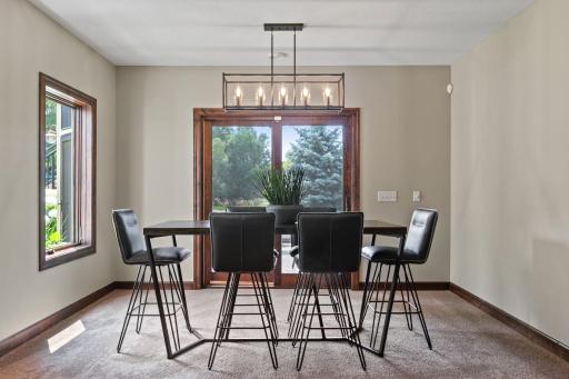 Full glass patio door w/ access to the screened-in-porch