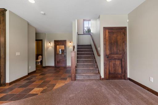 Staircase to Amusement Area & Family Room