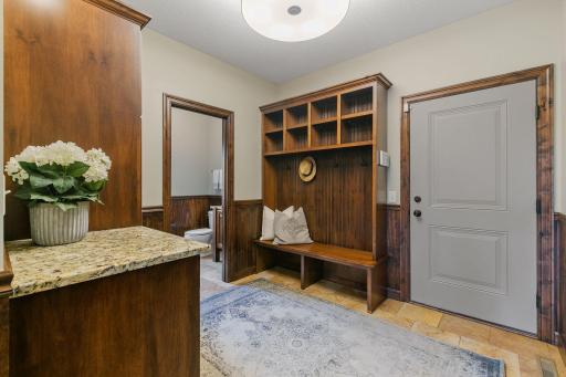 Select alder lockers offer cubbies, hooks and beadboard accents