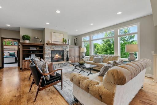 Alder entertainment cabinets feature open display shelving, storage and TV opening w/ retractable doors