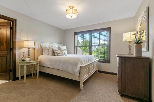 Bedroom 2 w/ outdoor views and walk-in closet