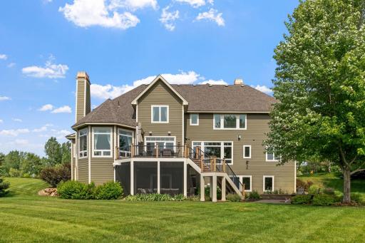 The maintenance-free deck, screened-in porch, and lovely patio with decorative concrete pavers and a built-in fire ring provide ample space for outdoor enjoyment.