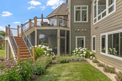 Underdecking protects this screened-in porch from weather