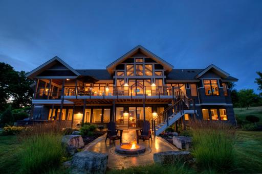 Enjoy a warm fire after sunset...this home has it all!
