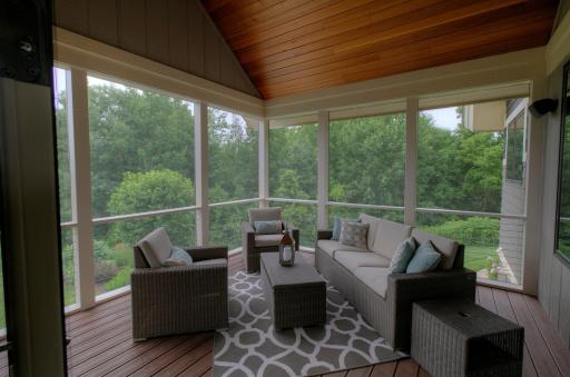 The screen porch will be one of your favorite rooms to relax...cool breezes and no bugs!