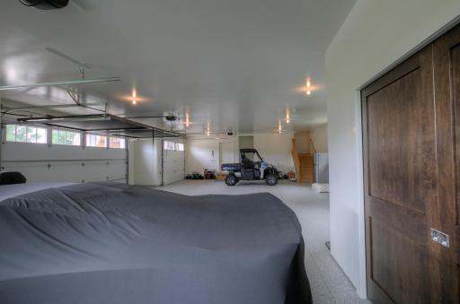 Garage floor has a nice walk-in closet for equipment and tool storage.