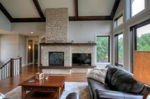 The living room and study share a 2-sided gas fireplace.