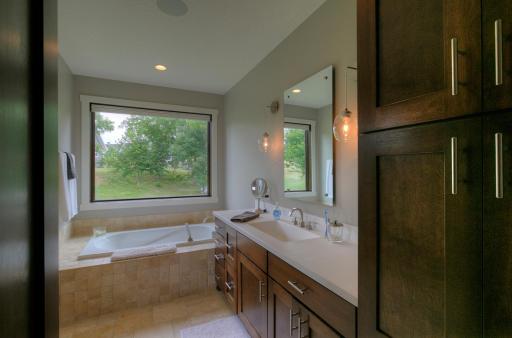 Owner's suite private full bath with heated floors.