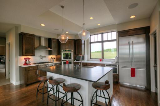 The kitchen has high-quality Thermador stainless appliances.
