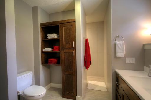 Guest suite 3/4 bath with Roman walk-in shower.