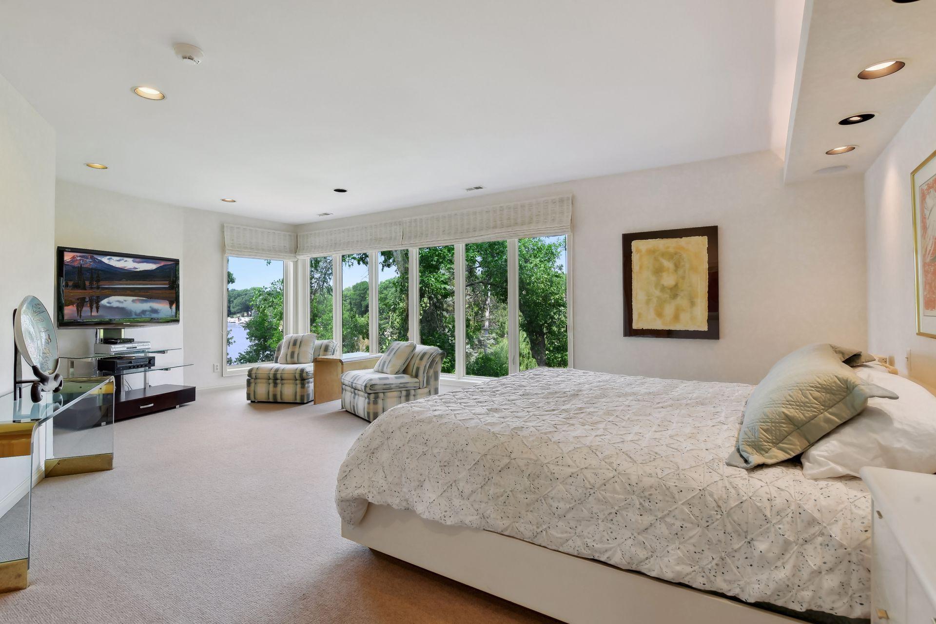 Incredible primary suite over looking the lake.