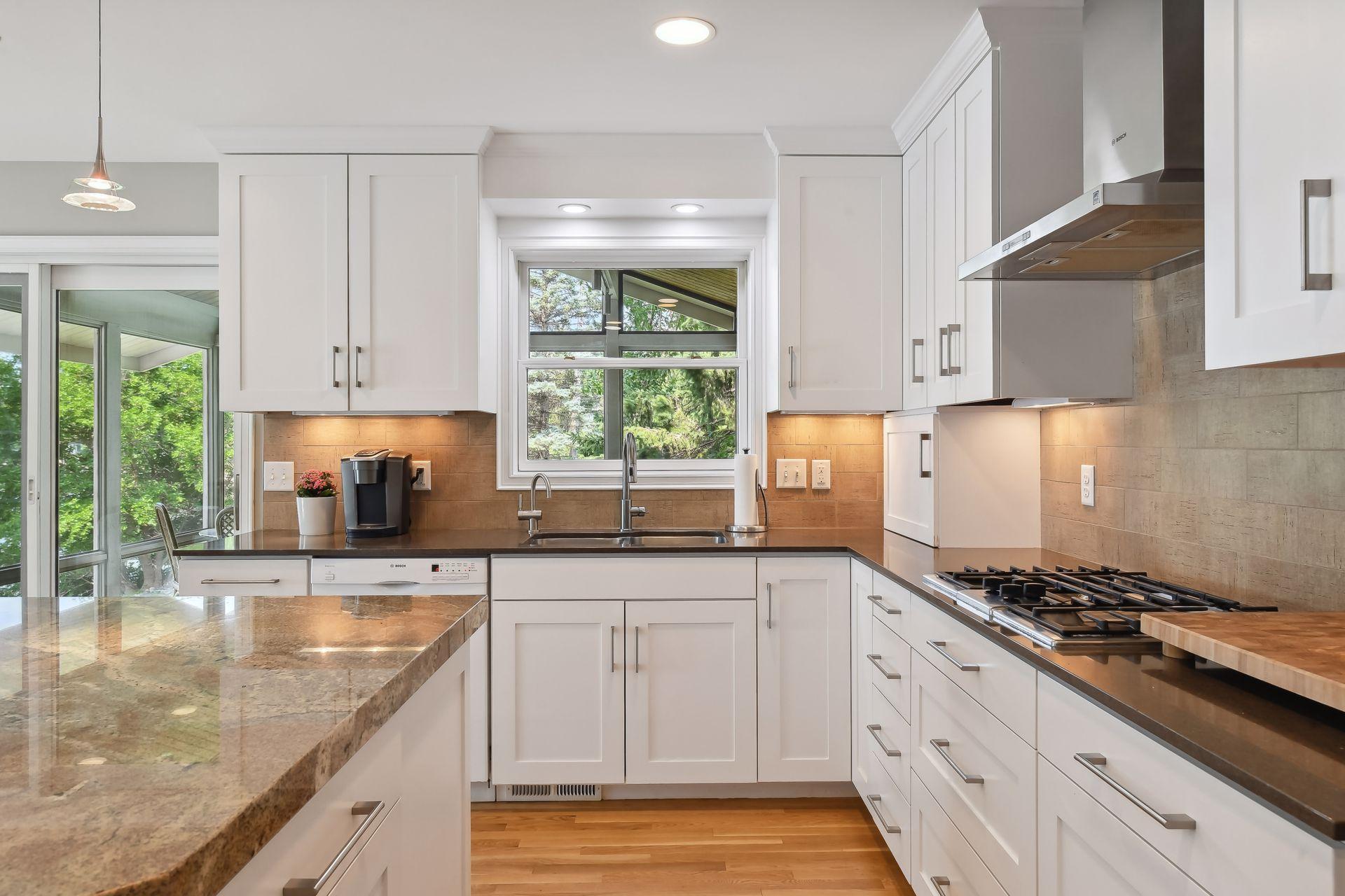 Lake views from kitchen window AND eat-in dining area.