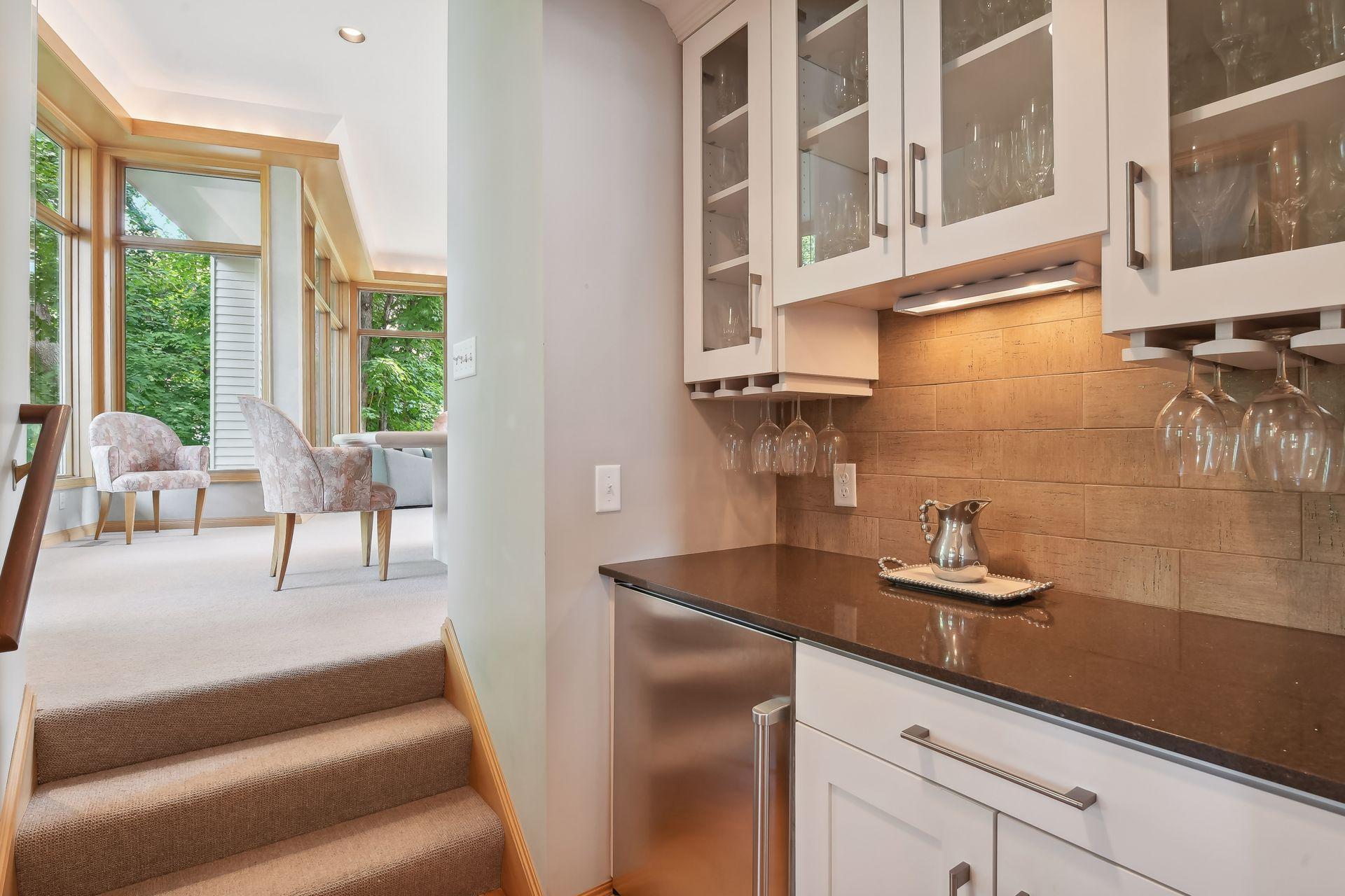 Back pantry with beverage fridge and more storage.