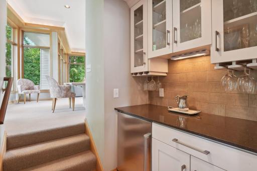Back pantry with beverage fridge and more storage.